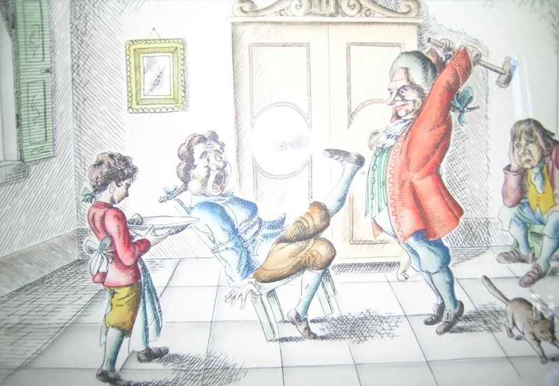 Un'illustrazione antica di una scena dal dentista, appesa nello studio